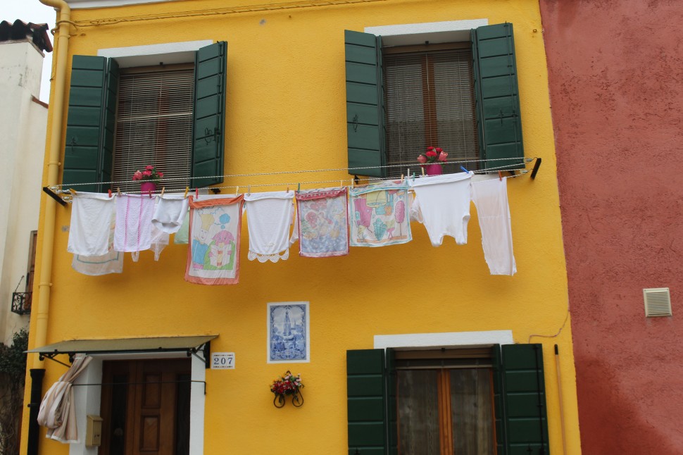 Yellow house with laundry in Burano