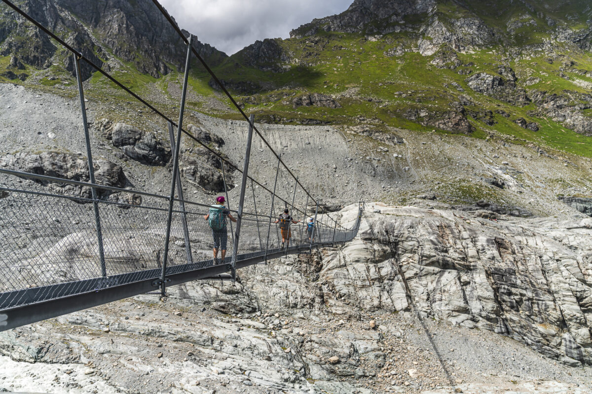Suspension bridge over glacier moraine